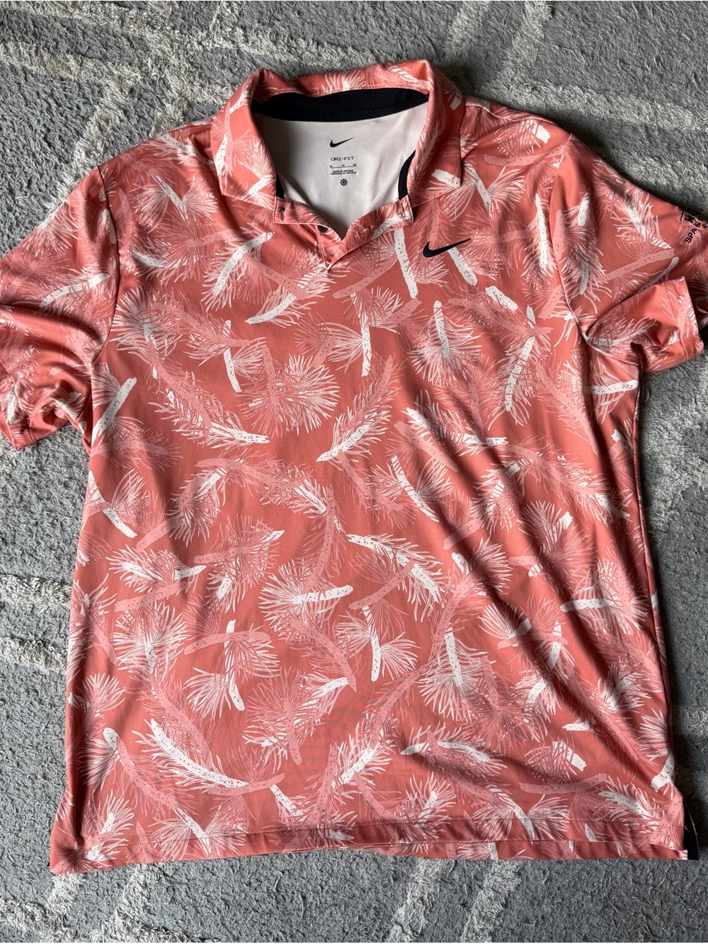 Nike Coral Polo with White Feather Print